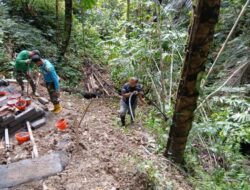Satgas TMMD dan Warga Gotong Royong Salurkan Air Bersih