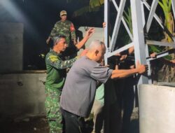 Kodim 1606 Mataram Pasang Tiang Pilon Jembatan Perintis Garuda