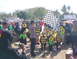 Polsek Lape Kawal Ketat Pengamanan Pawai Budaya di Kecamatan Lopok, Semarakkan HUT RI ke-81