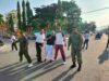 Semarakkan Program STBM, Bhabinkamtibmas Kelurahan Arab Kenangan Dampingi Jalan Santai dan Senam Bersama Warga